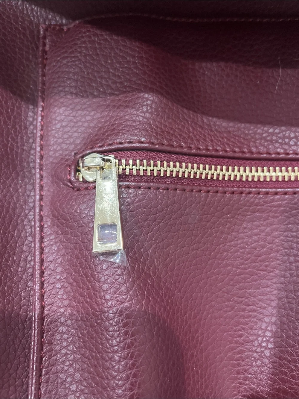 Fawn Design Burgundy Pebbled Faux Leather Backpack